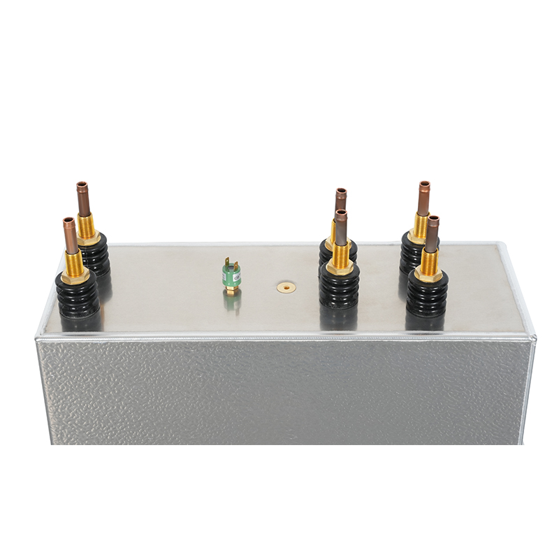 Thermodynamic Influence of Coolant Velocity on the Dissipation Factor of Water Cooled Capacitors